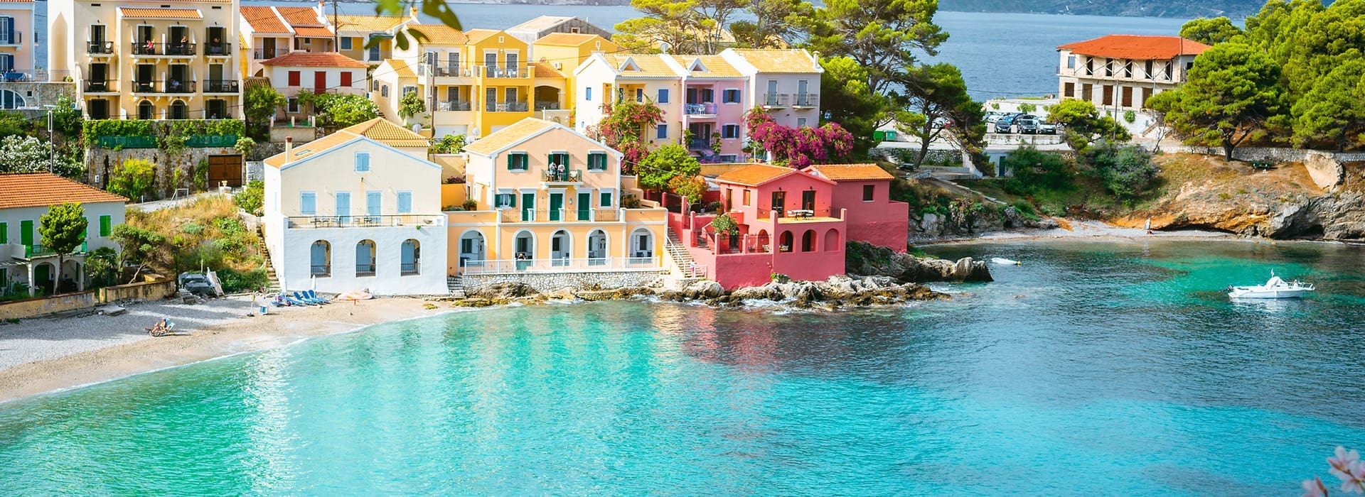 Scenic coastal view of Assos Village surrounded by hills in Kefalonia Greece